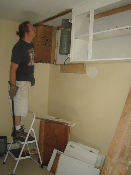 tearing out cabinets
